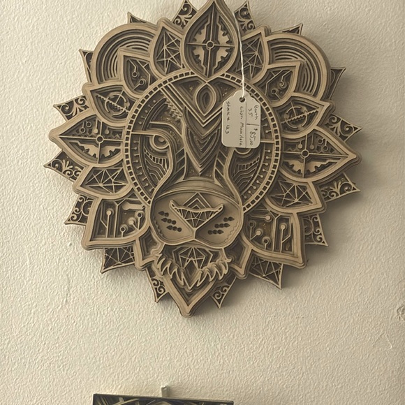 A powerful lionout of basswood to be true conversation piece on any wall